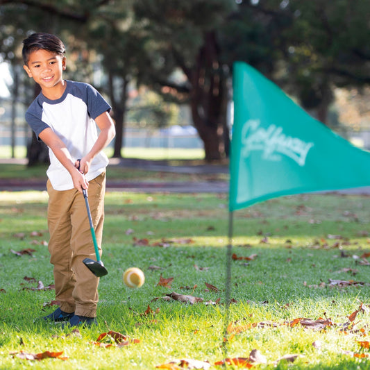 Families enjoying sports and outdoor games at a UK holiday park.